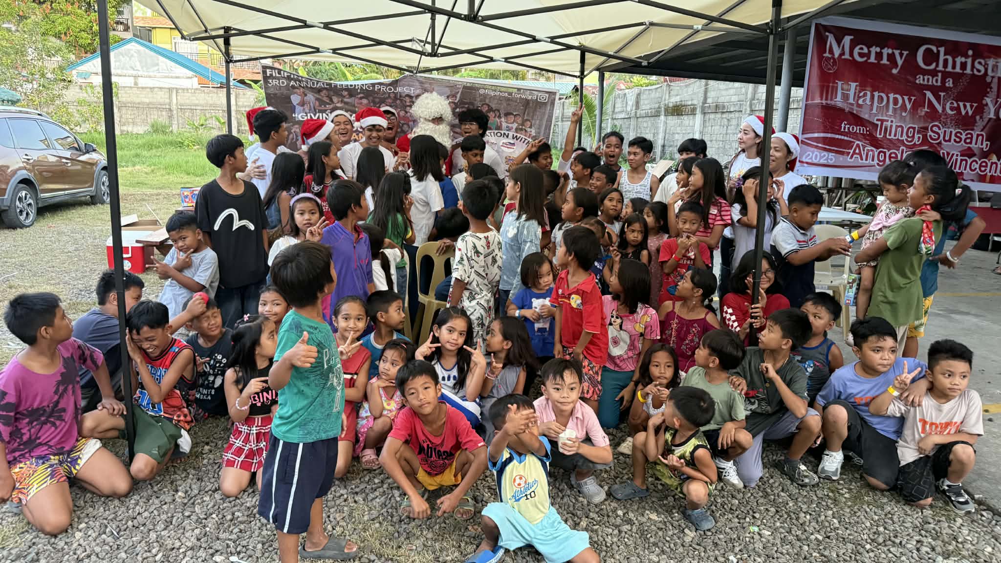 Community gathering at the 2025 Annual Christmas Feeding Project