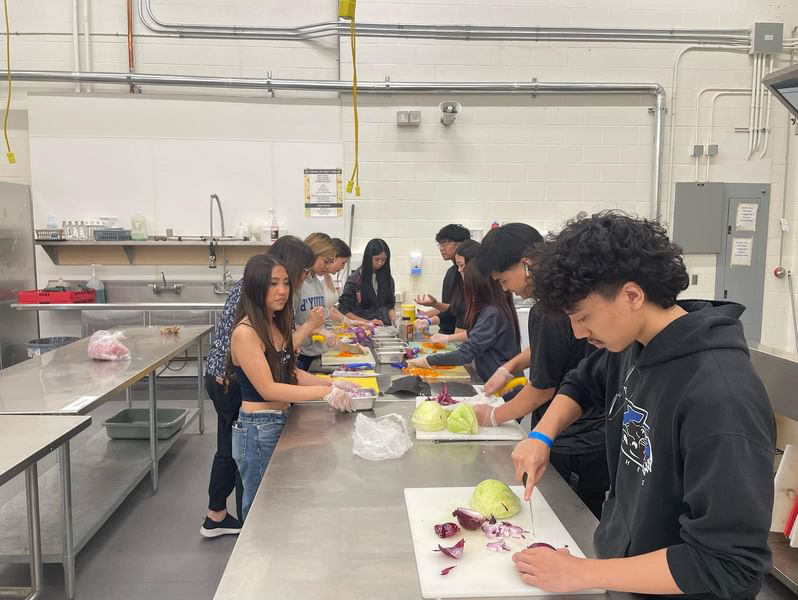 High school students at a Filipino cooking class workshop